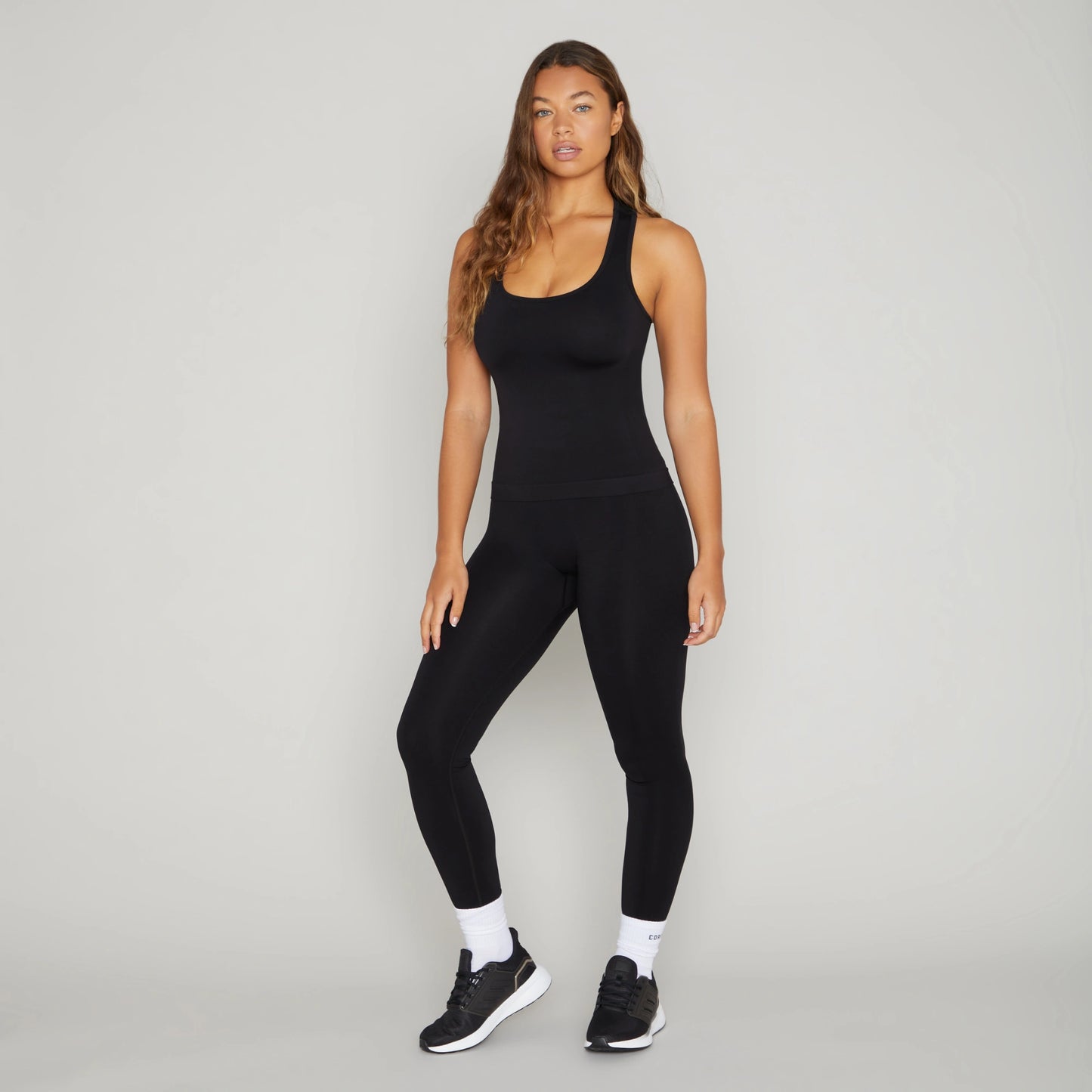 Correndo Women's workout outfit with racer back detail, Sleeveless gym top with Sculpted, supportive, soft touch, four way stretch with anti-bacterial and quick dry finish. the perfect gym top for women.