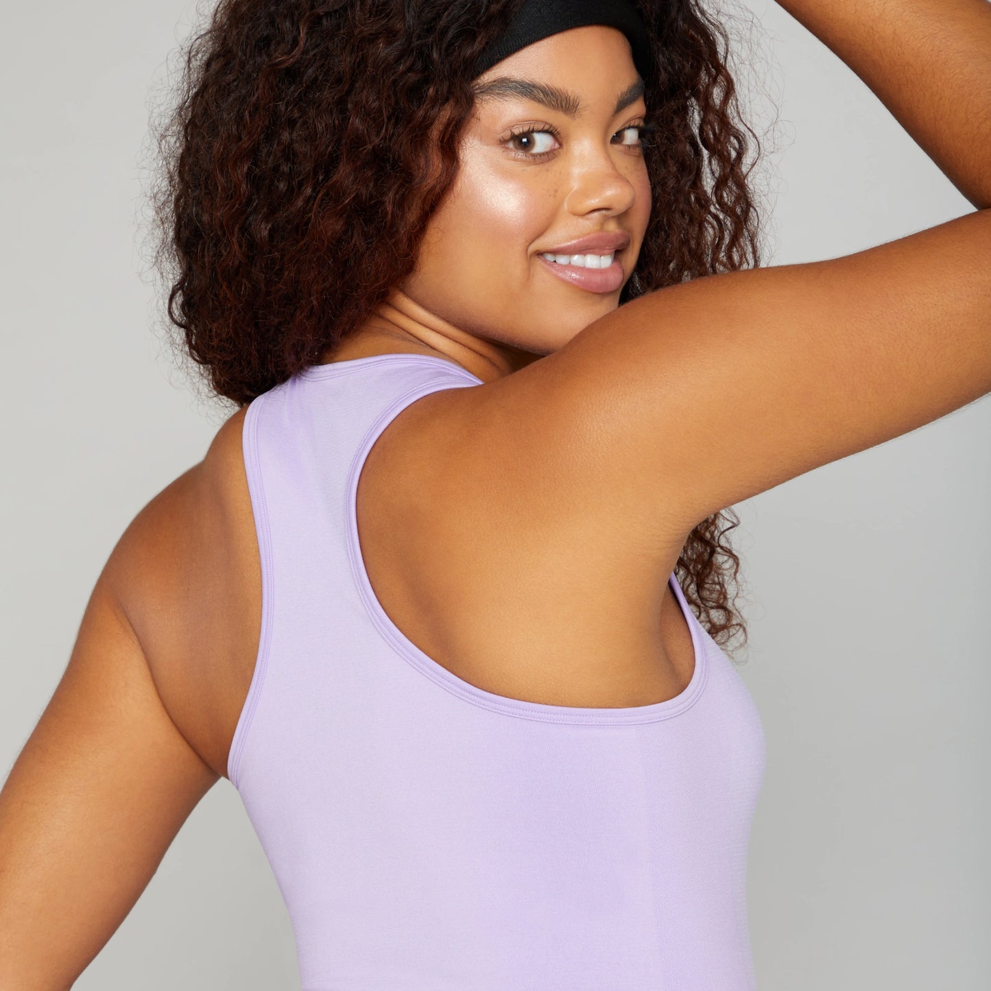 Correndo Women's workout outfit with racer back detail, Sleeveless gym top with Sculpted, supportive, soft touch, four way stretch with anti-bacterial and quick dry finish. the perfect gym top for women.
